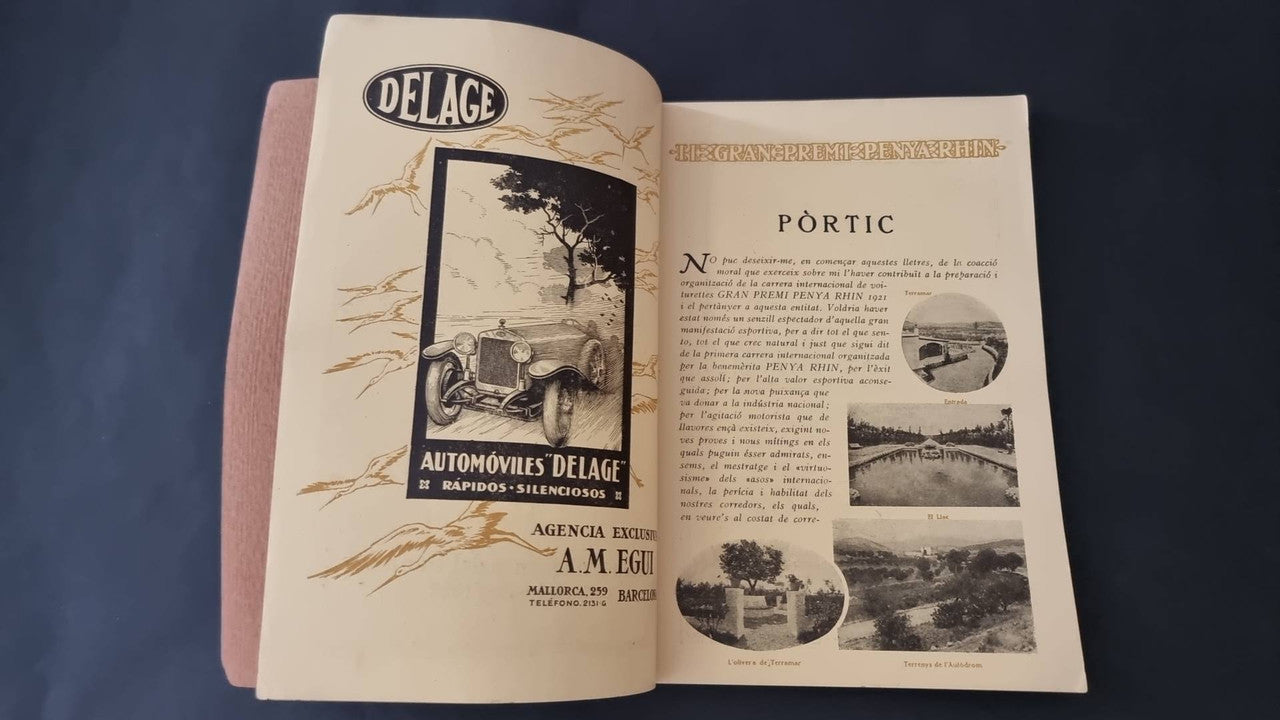 Vintage open booklet with Delage branding, car artwork, and landscape photos