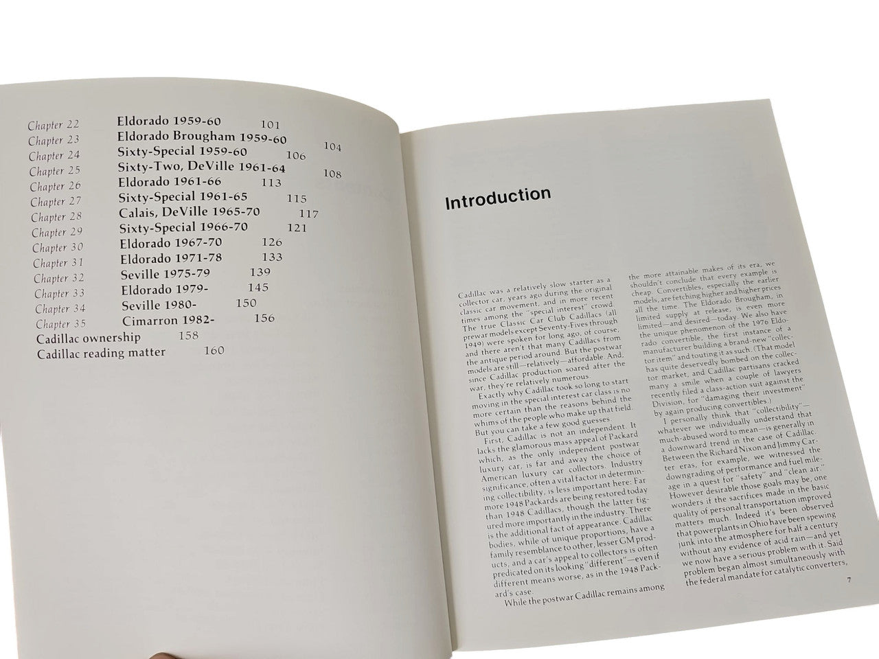 Vintage auto buyer's guide book open to introduction and numbered model list