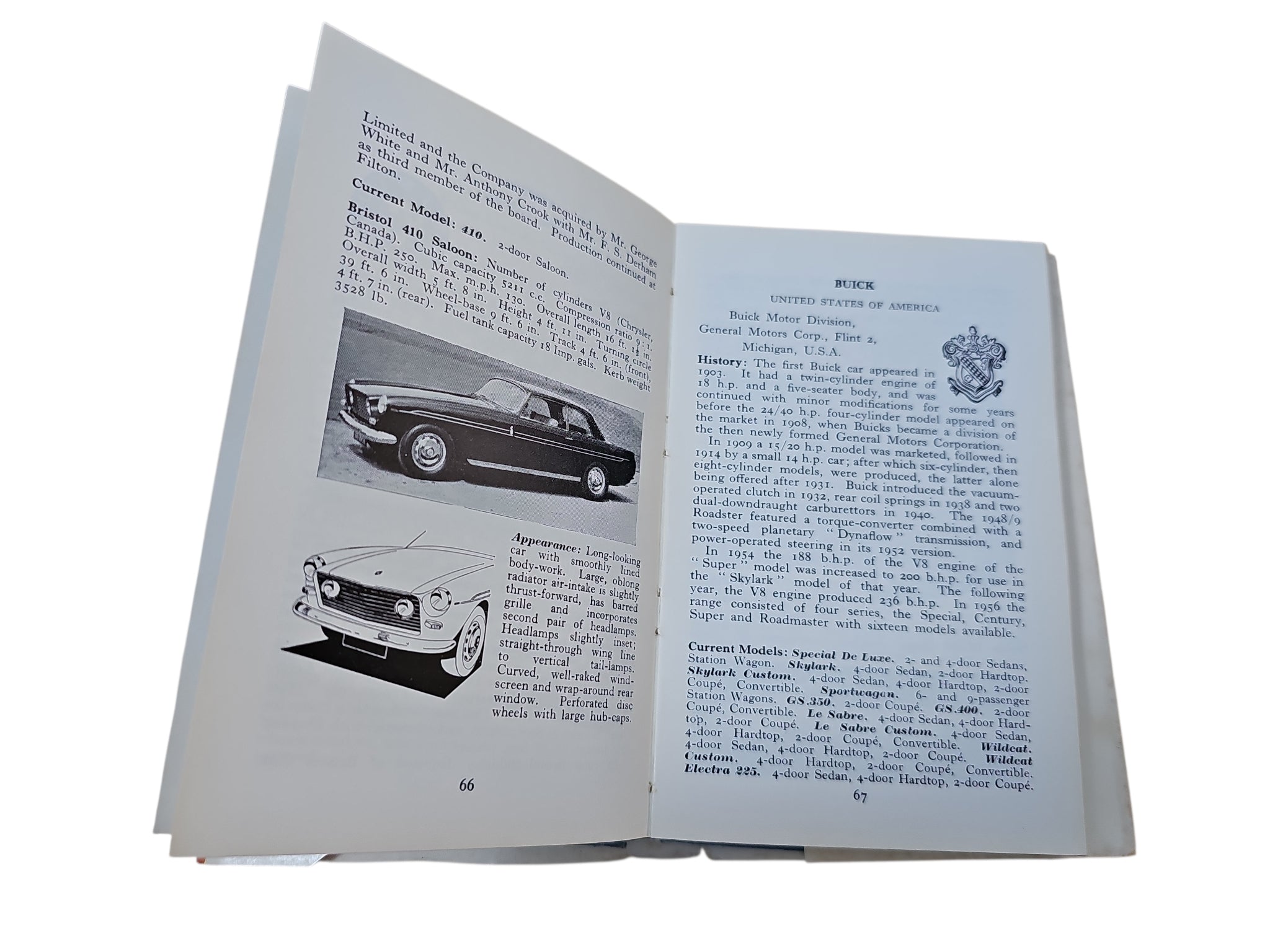Open vintage automobile book with car illustrations on the left and printed text on the right