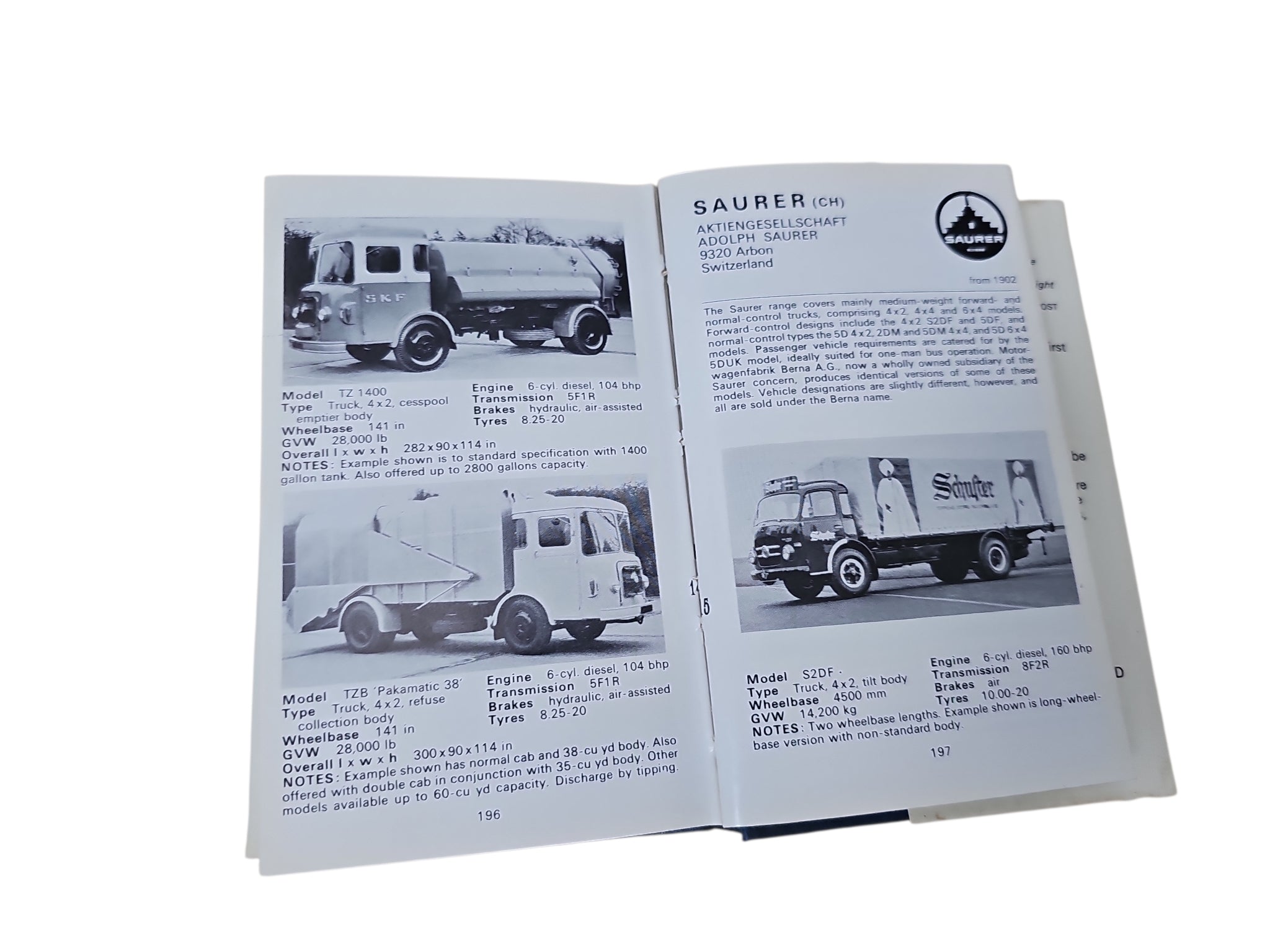 Open book spread with model specifications and vehicle photos on both pages