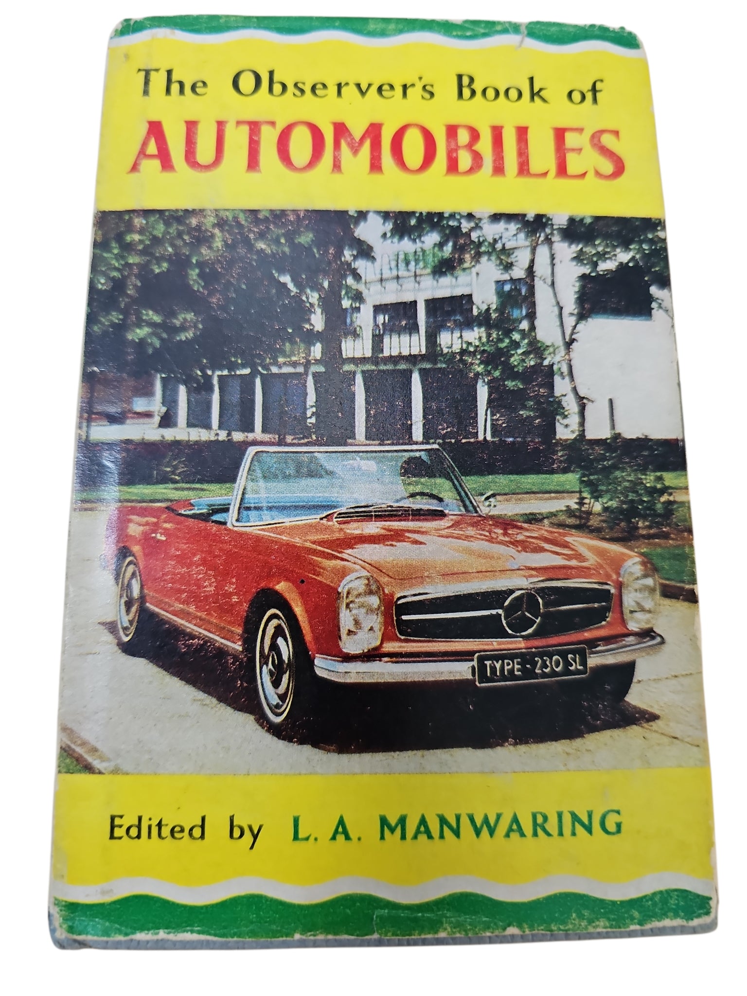 Vintage automobiles book with red car cover and yellow-green border