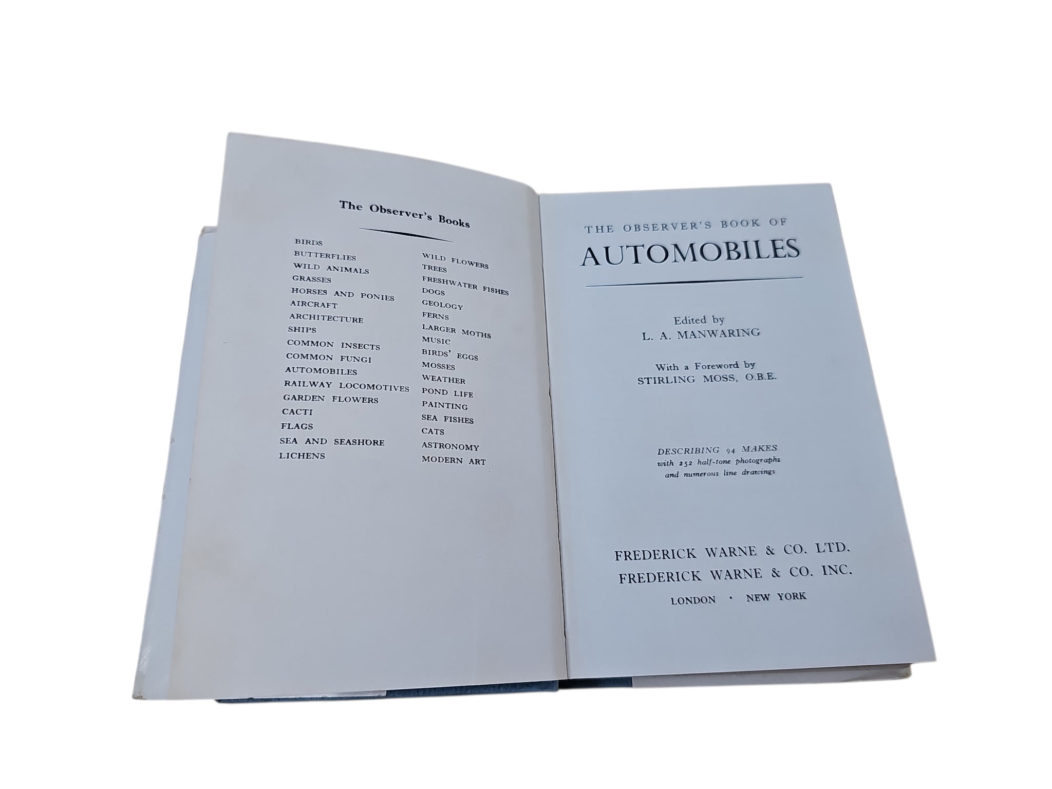 Opened Automobiles book with title page on right and index text on left