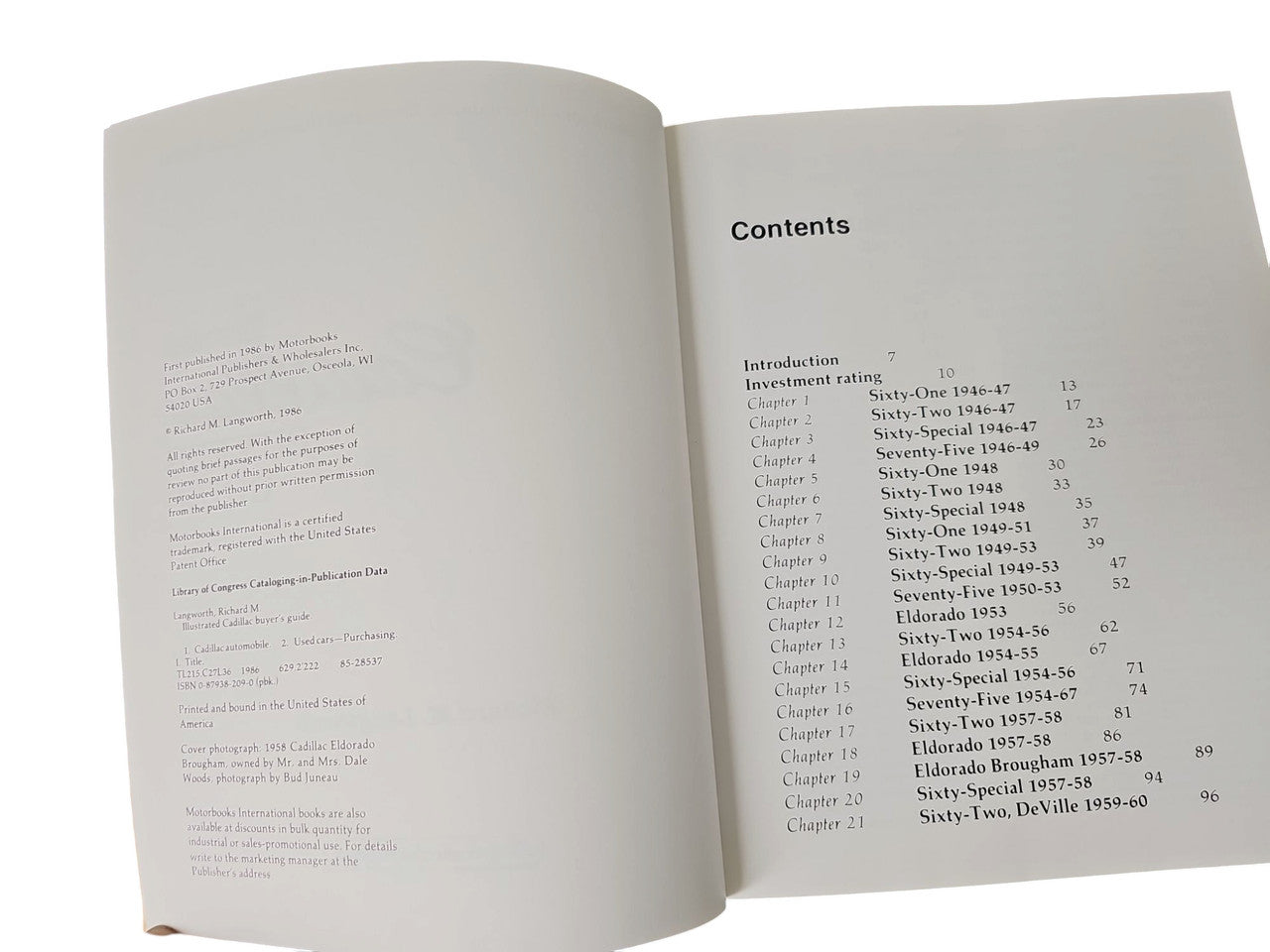 Vintage auto buyer's guide book open to contents page with chapter list