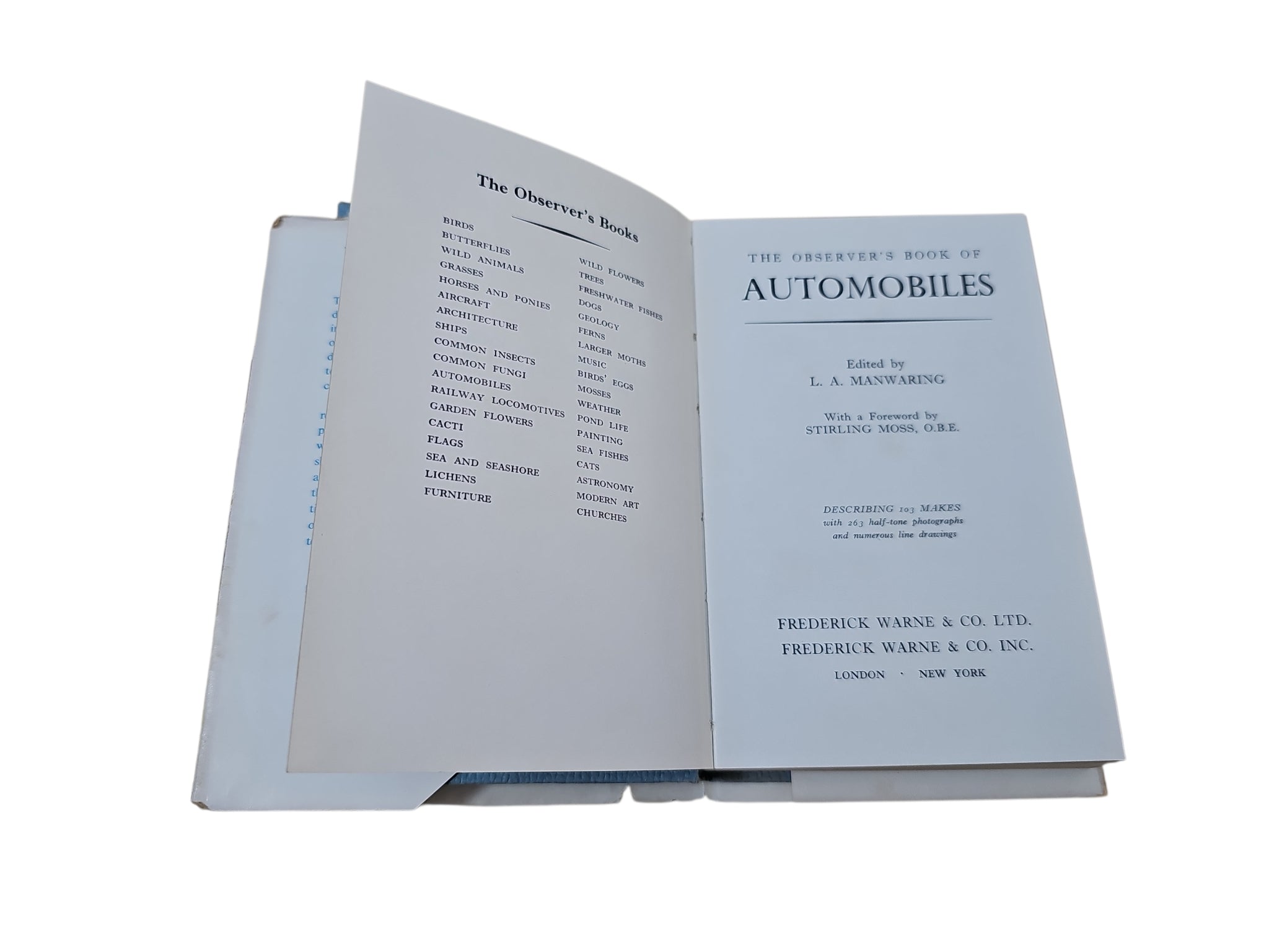 Open book with title pages and author and publisher text
