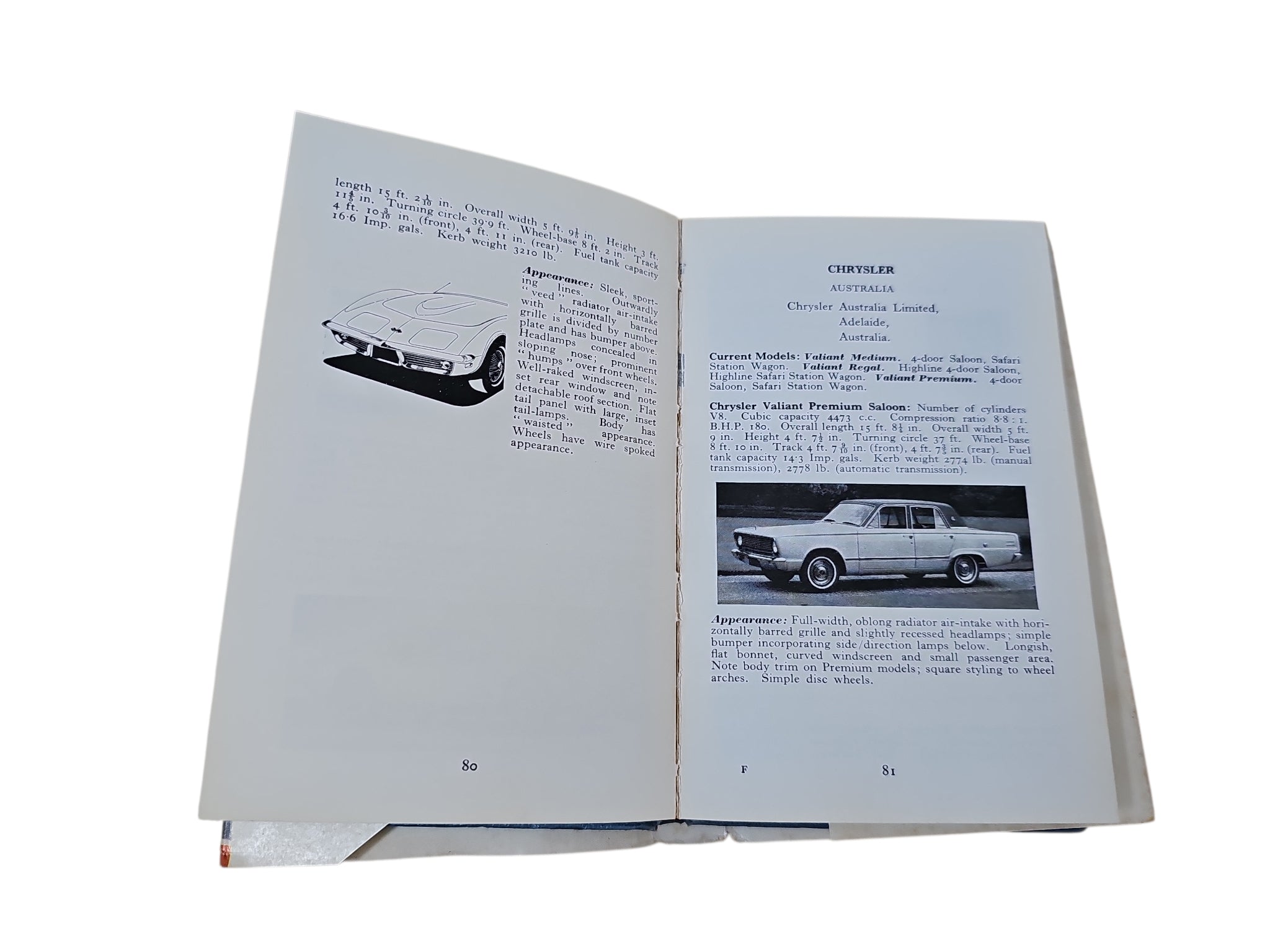 Open vintage automobile book with two page layouts and car photos with captions
