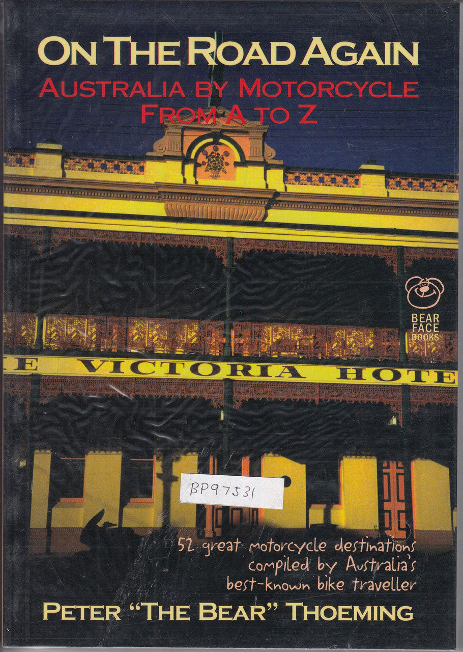 Motorcycle travel guide book cover with vintage Australia road scene and Victoria Hotel text