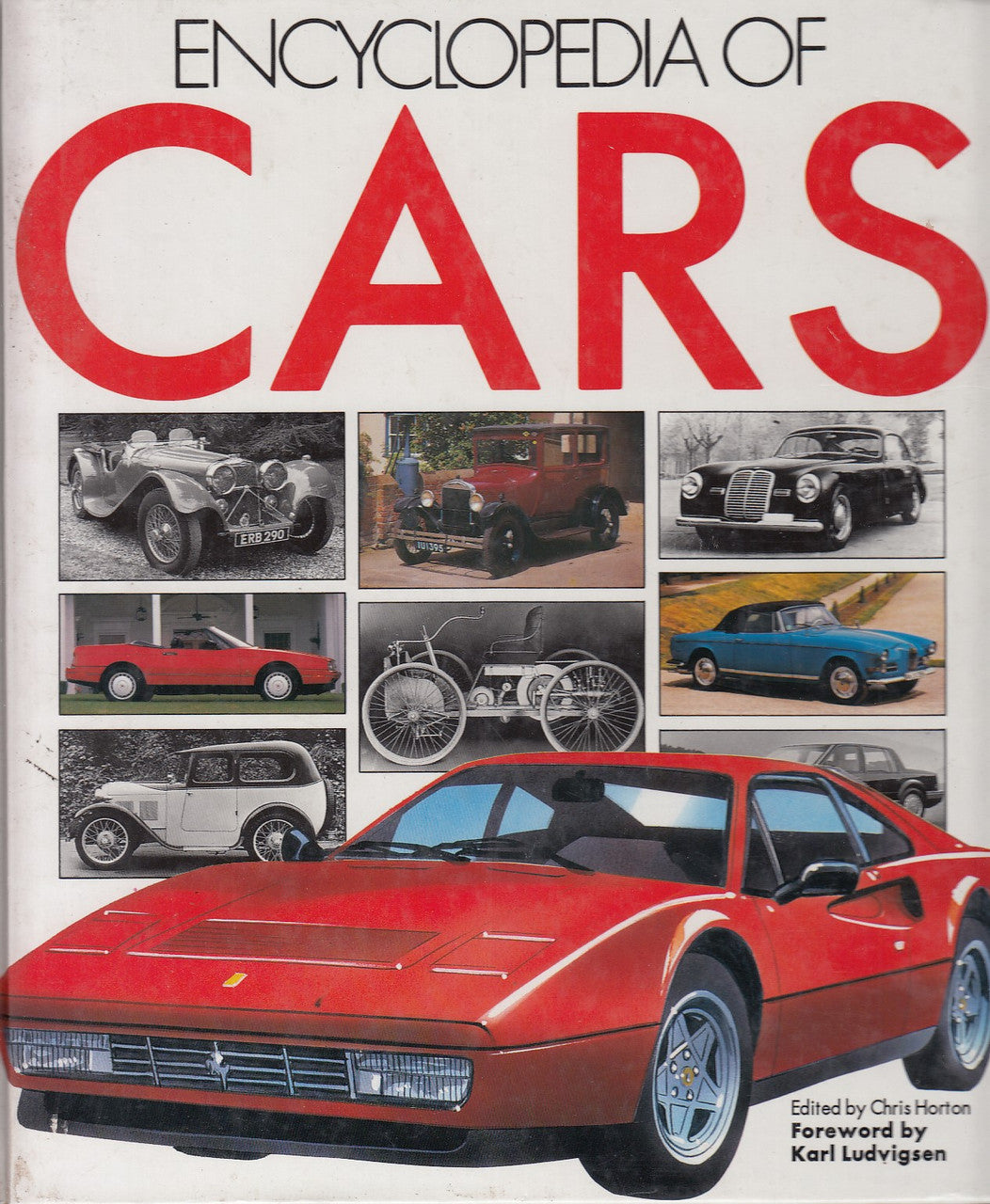 Hardback car encyclopedia book with red cover and collage of vintage cars, title text