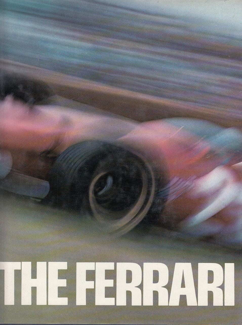 Racing car poster print with front wheel and "THE FERRARI" title