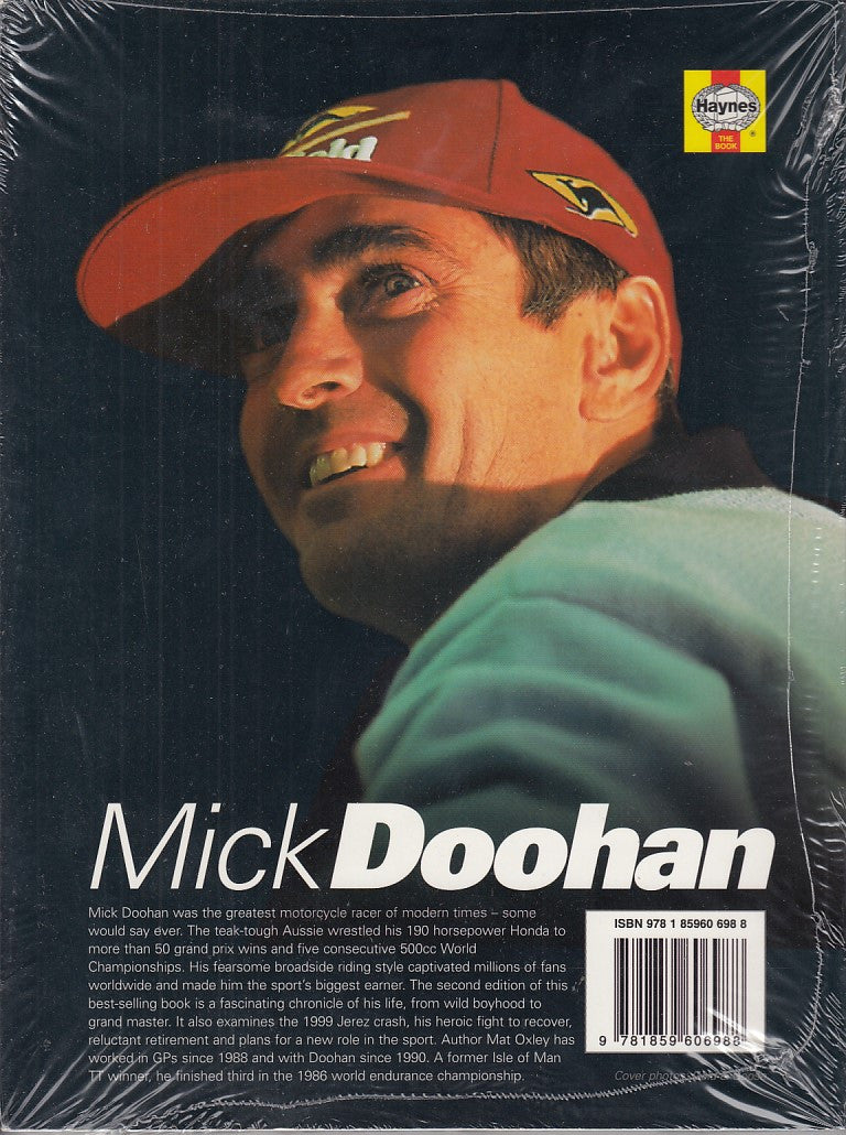 Mick Doohan book cover with close-up man in cap, title and author text
