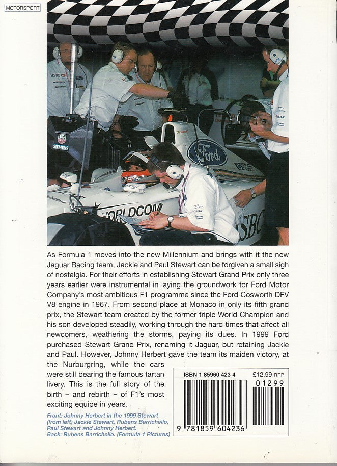 Stewart Formula 1 Racing Team book back cover with race car and mechanics in workshop