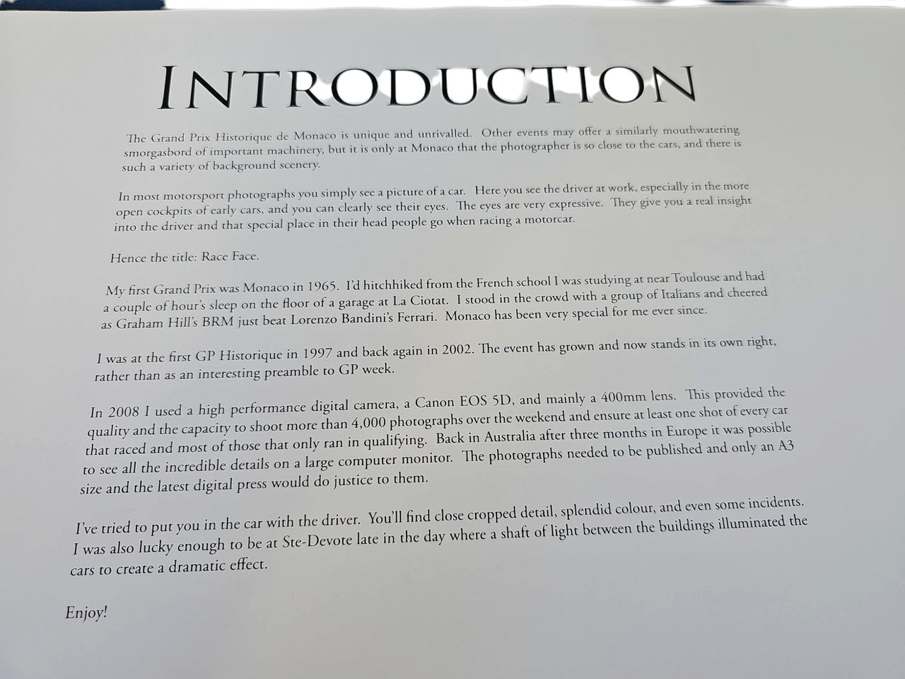 Commemorative race photo album close-up of Introduction text in black serif