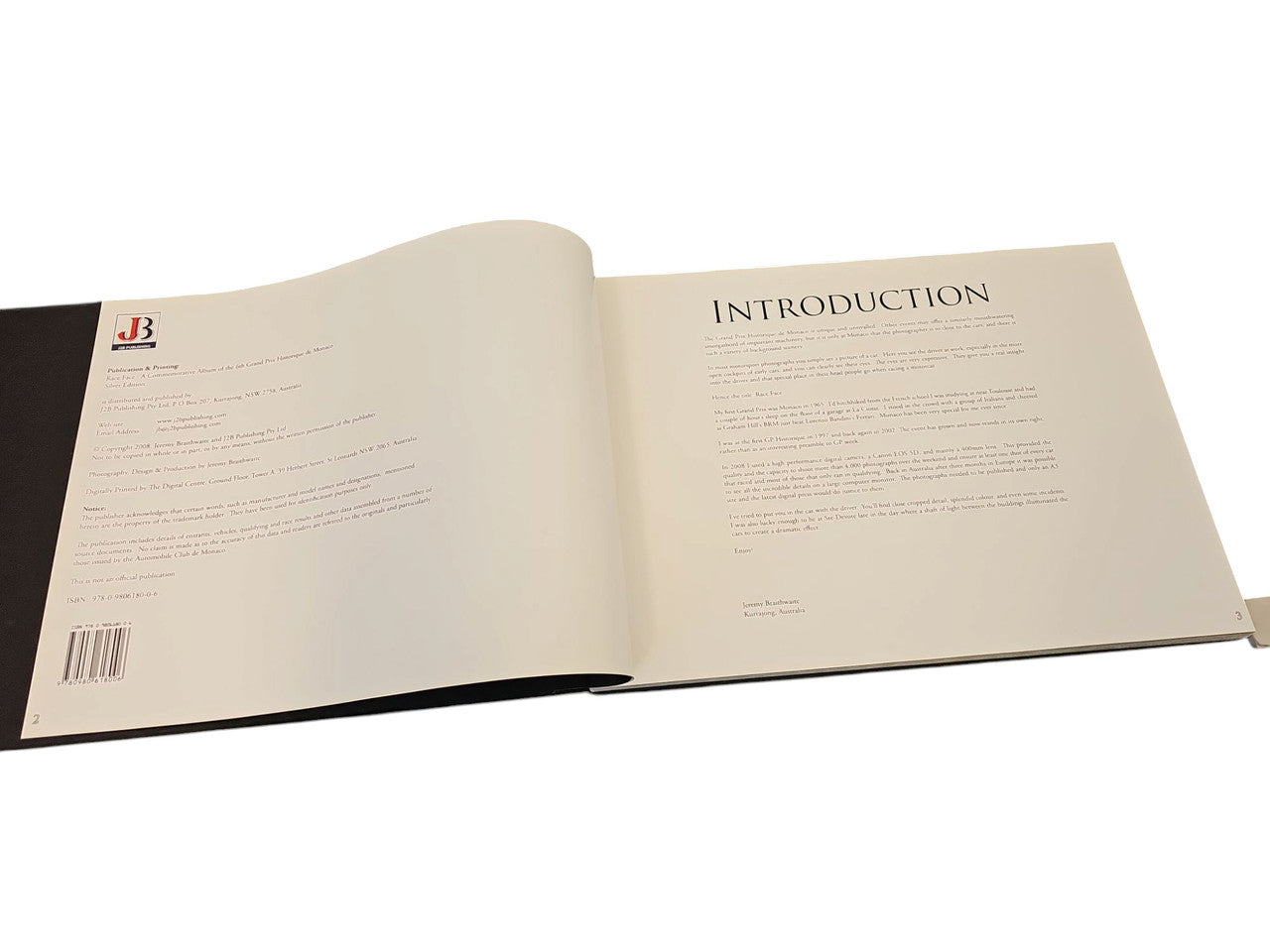 Race Face racing book open to introduction page with printed paragraphs