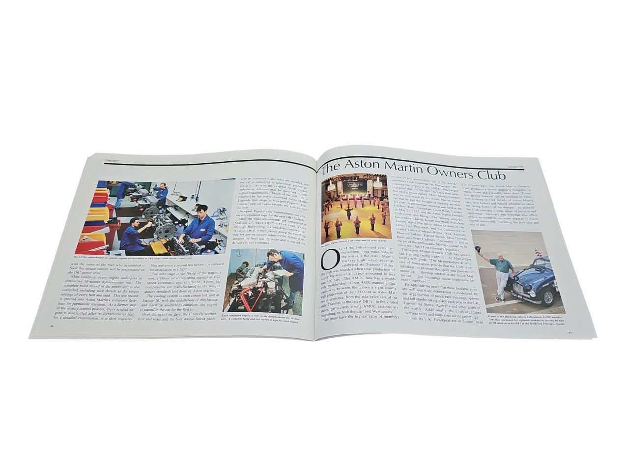 Open book spread showing multiple articles with small car photos and captions