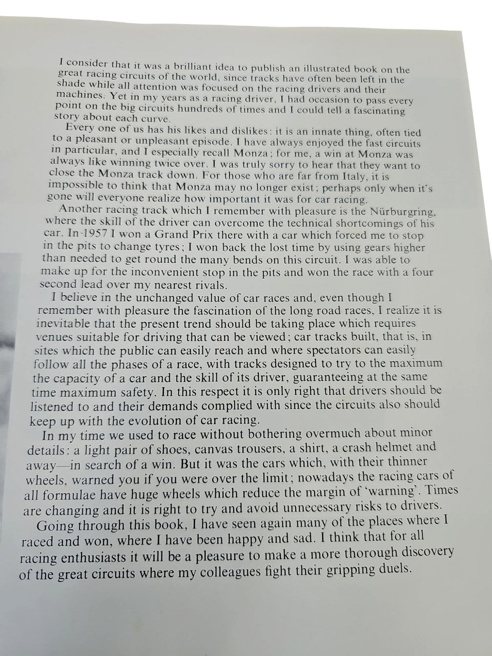 Book page filled with dense black text, single-column layout on cream paper.