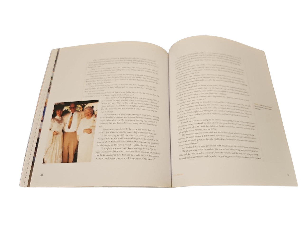 Open book with two printed pages and a small photo inset
