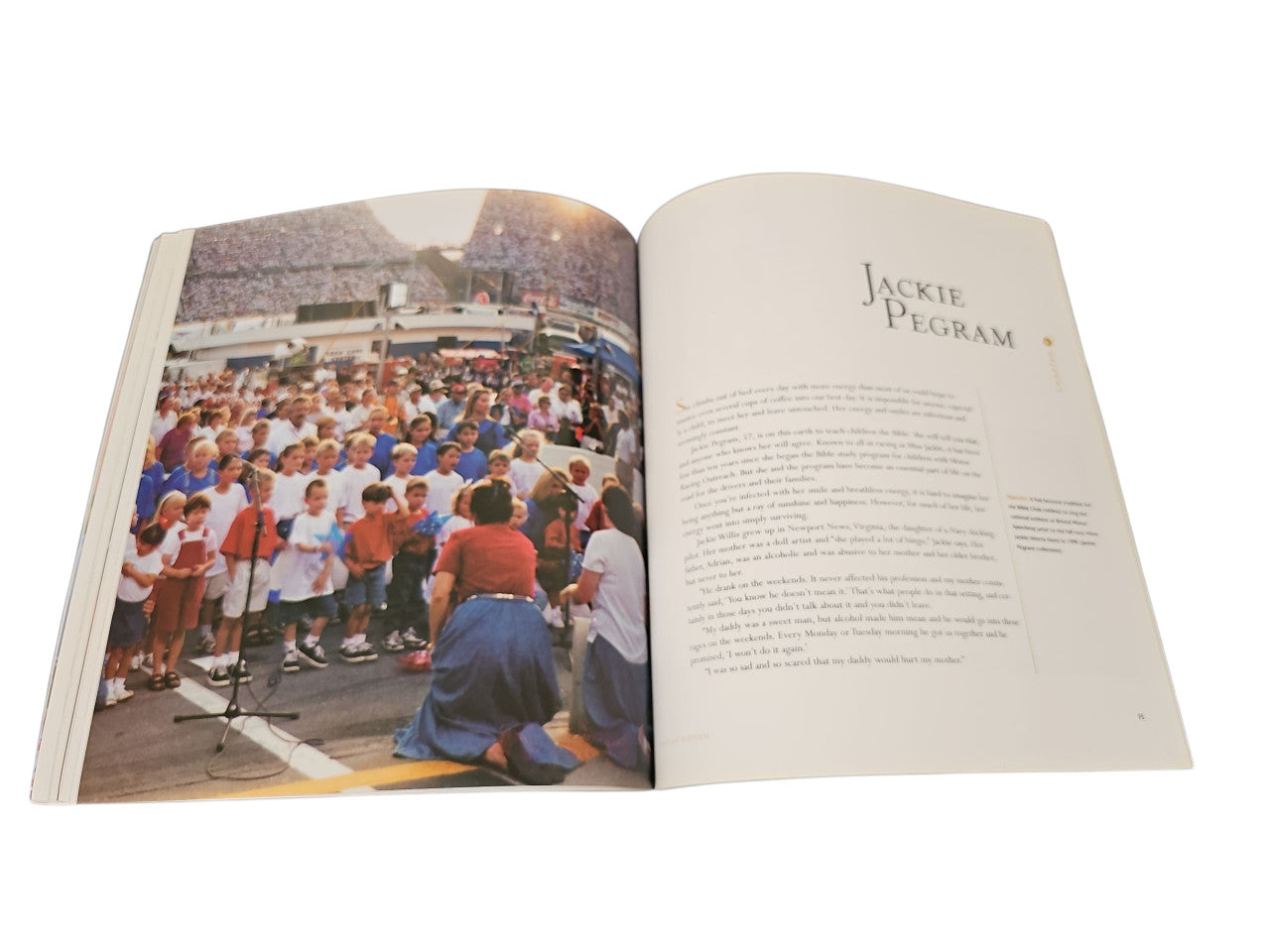 Open book with a crowd photo on the left and Jackie Depegram text on the right