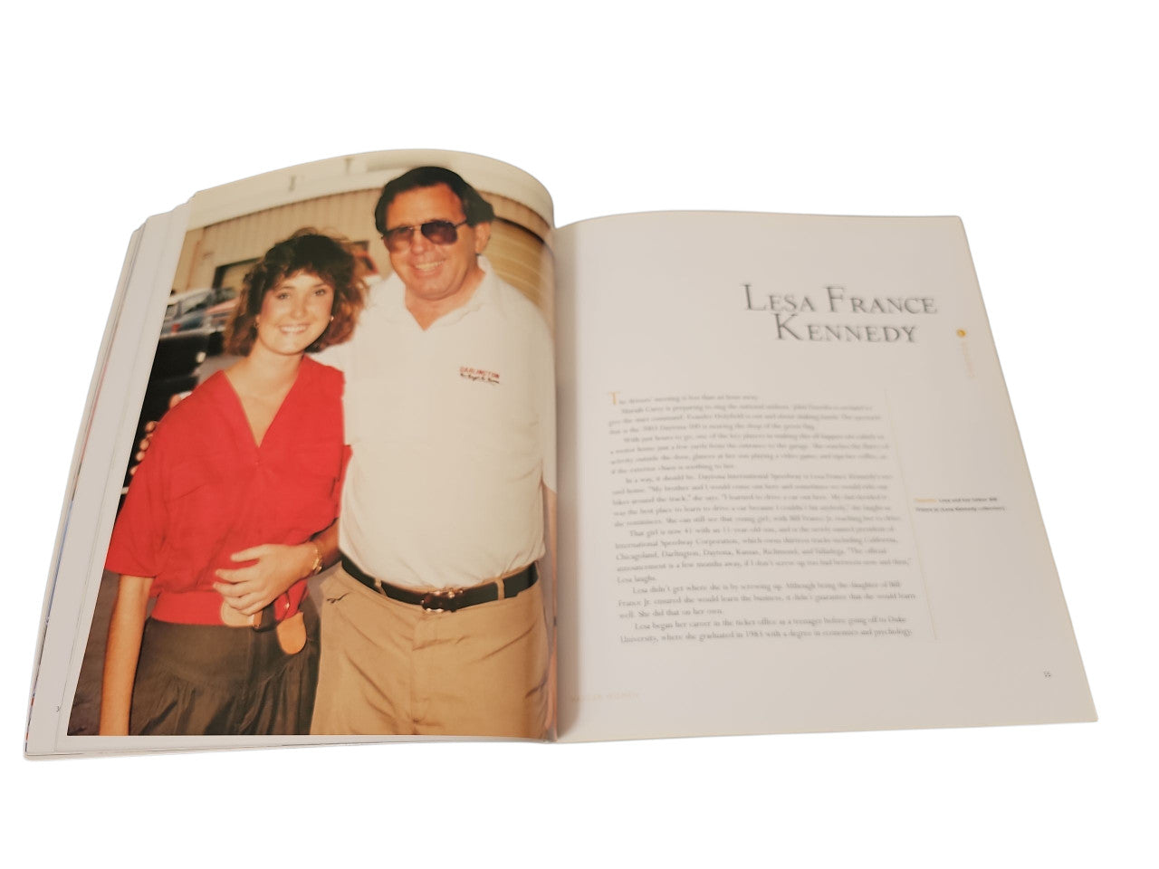 Open book with a couple photo on the left and chapter text on the right