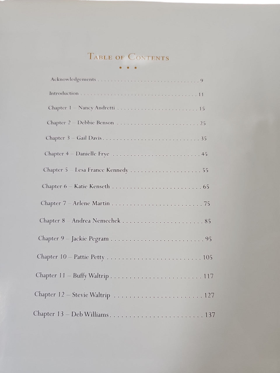 Book page showing a Table of Contents list with dotted lines