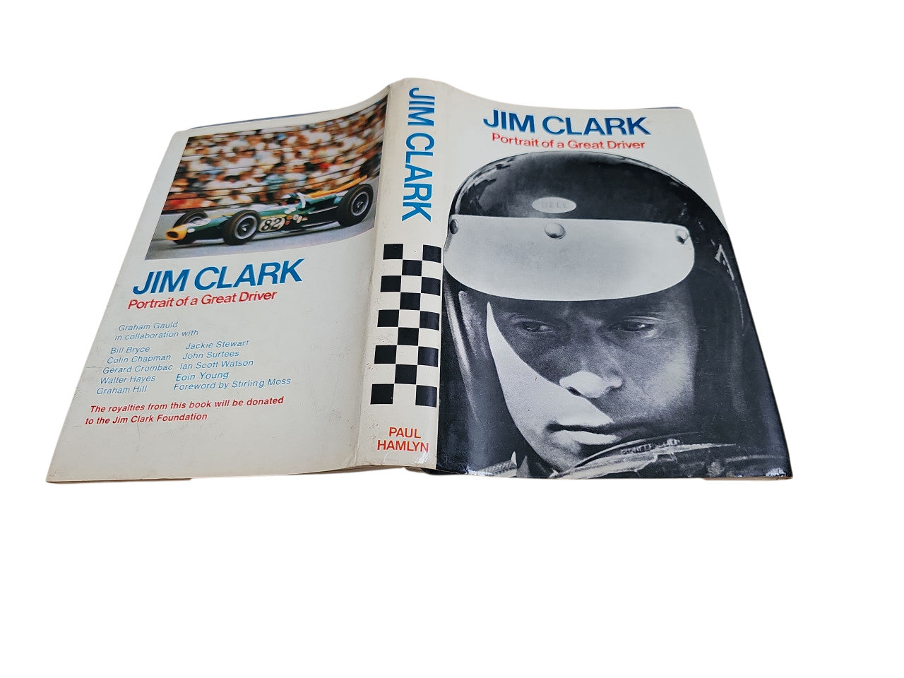 Motorsport book cover with Jim Clark portrait, racing imagery, and author name