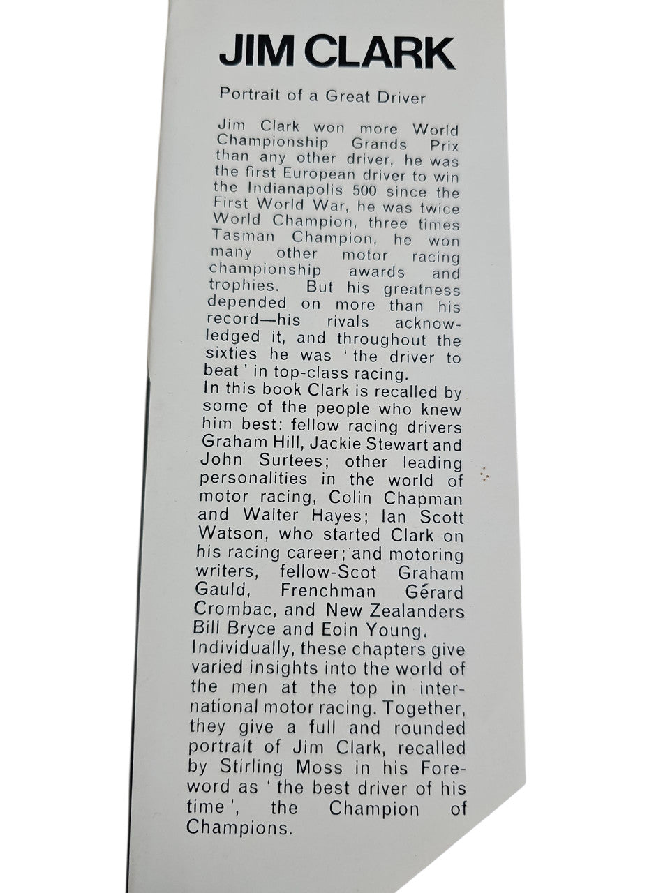 Close-up of motorsport book text page with header 'JIM CLARK' and paragraphs