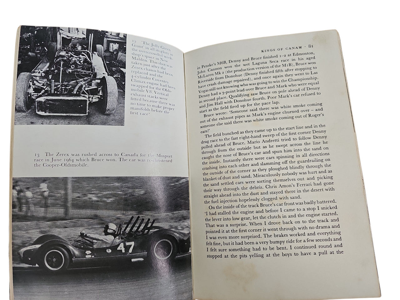 Open hardcover book showing two-page spread with racing photo and dense text