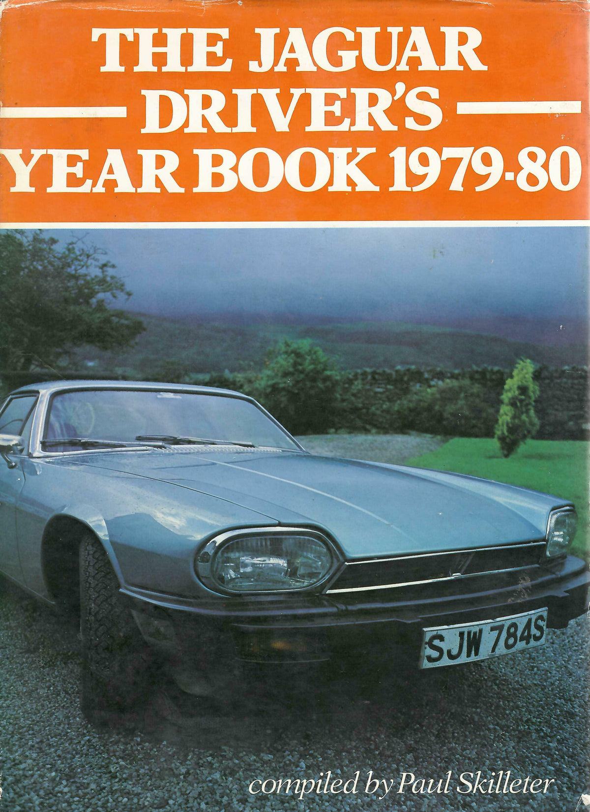 Jaguar Driver's Year Book 1979-80 with orange cover and front car photo