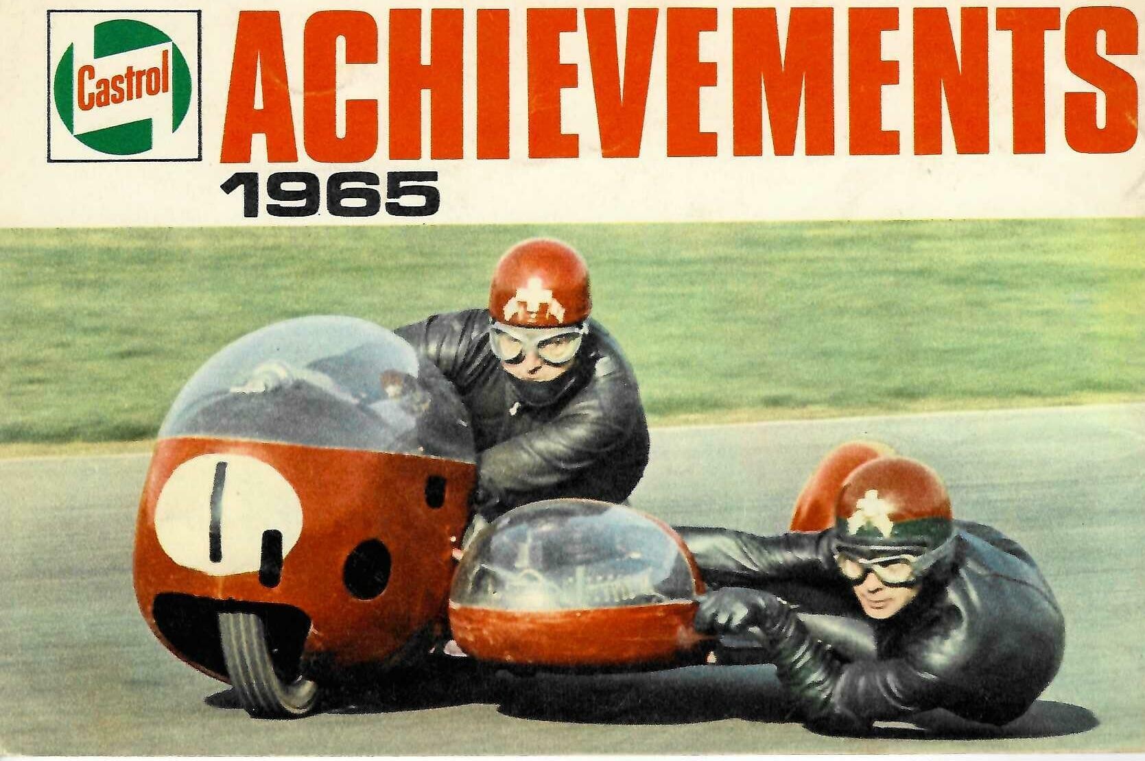 Vintage racing magazine cover with red 1965 title and two helmets by race car cockpit