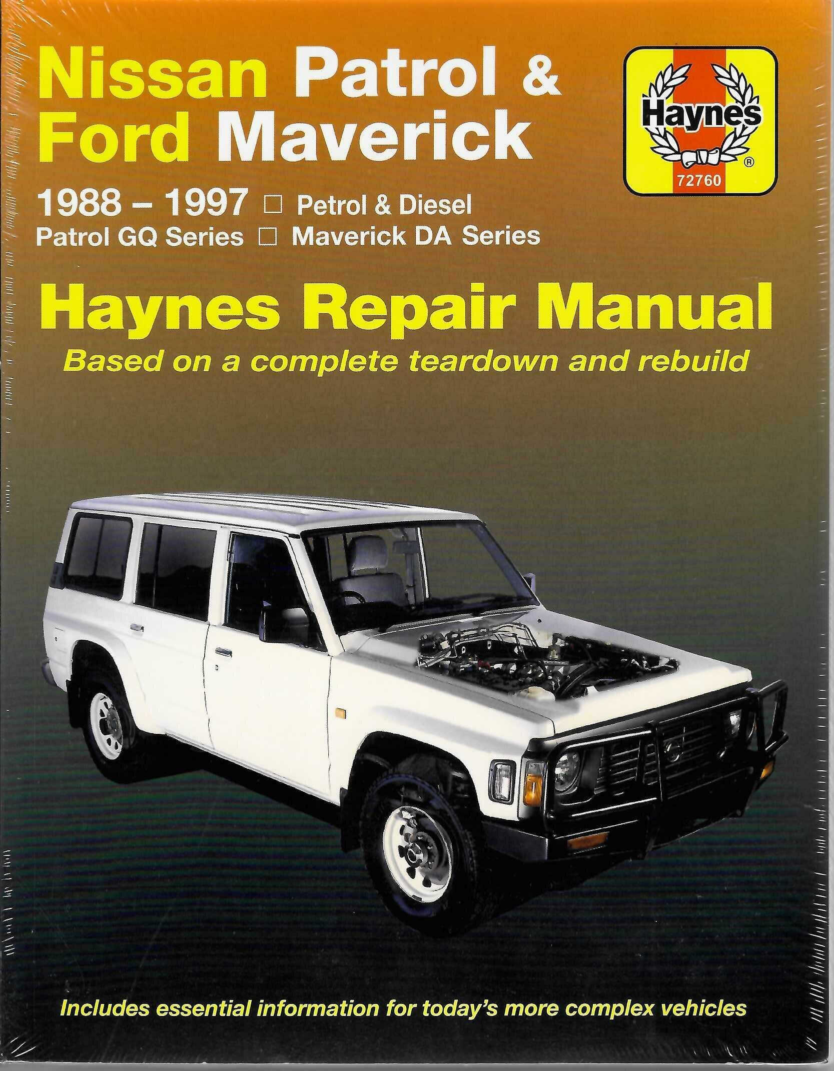 Auto repair manual book front cover with white truck and engine photo