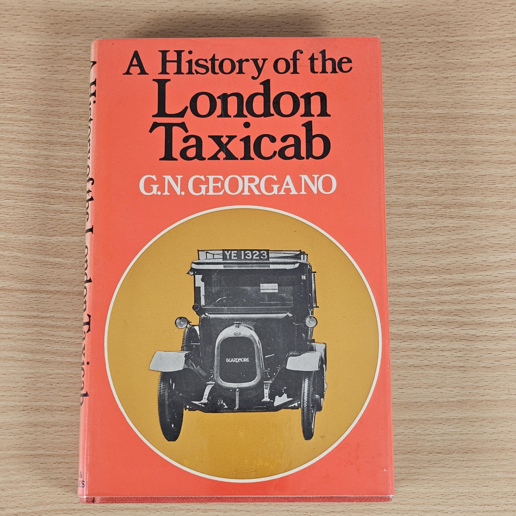 Book cover with London Taxicab title and centered vintage vehicle illustration
