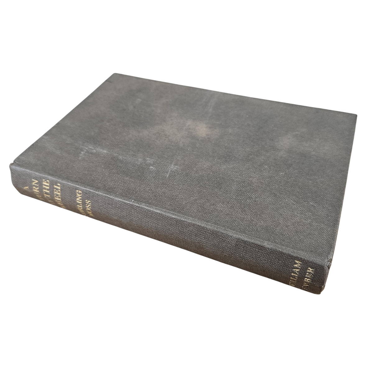 Vintage hardcover racing book with dark gray cloth cover, angled view