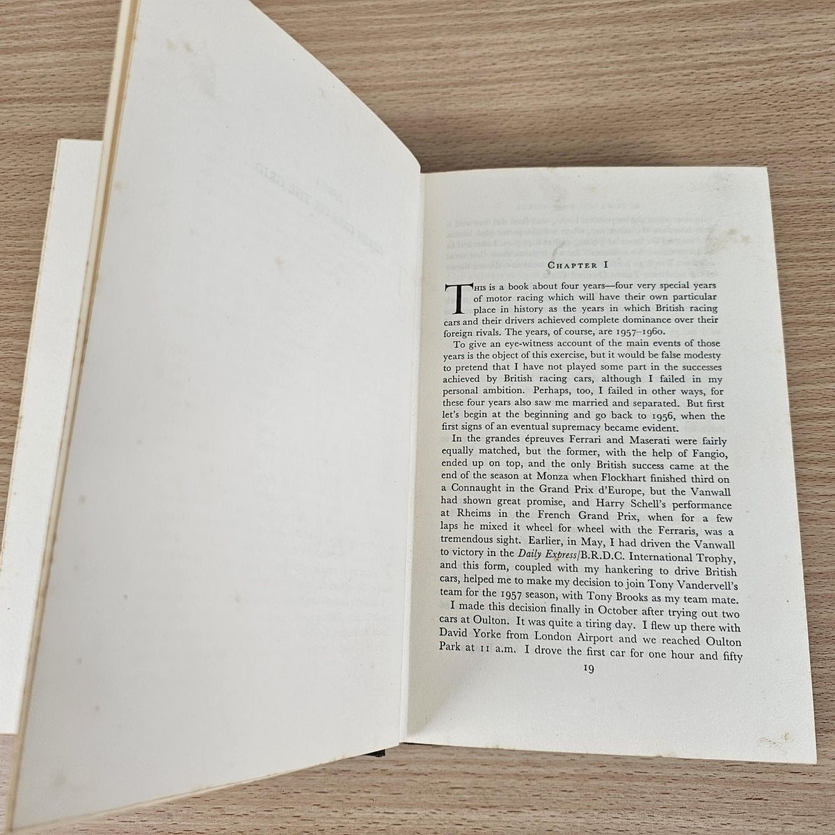 Open vintage book with close-up pages and dense paragraph text