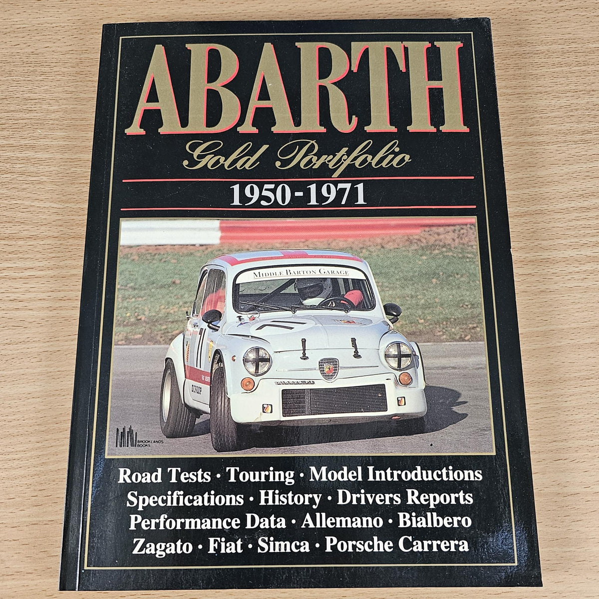 Abarth Gold Portfolio 1950-1971 road tests book, black cover with classic car photo