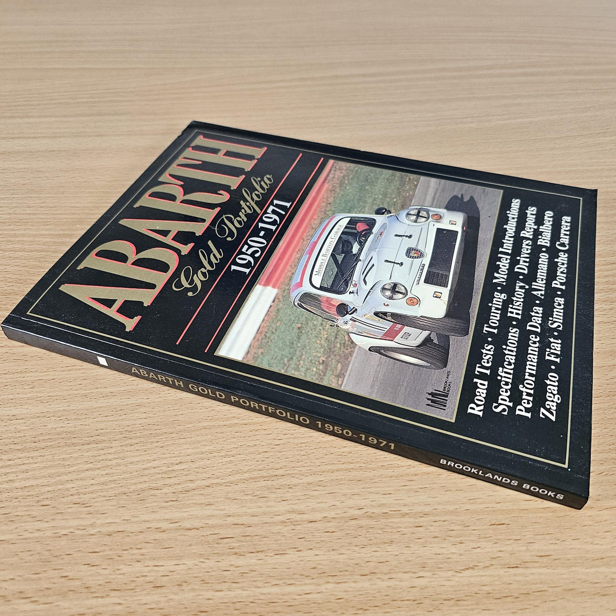 Abarth Gold Portfolio 1950-1971 book, angled cover with Abarth cars and title text