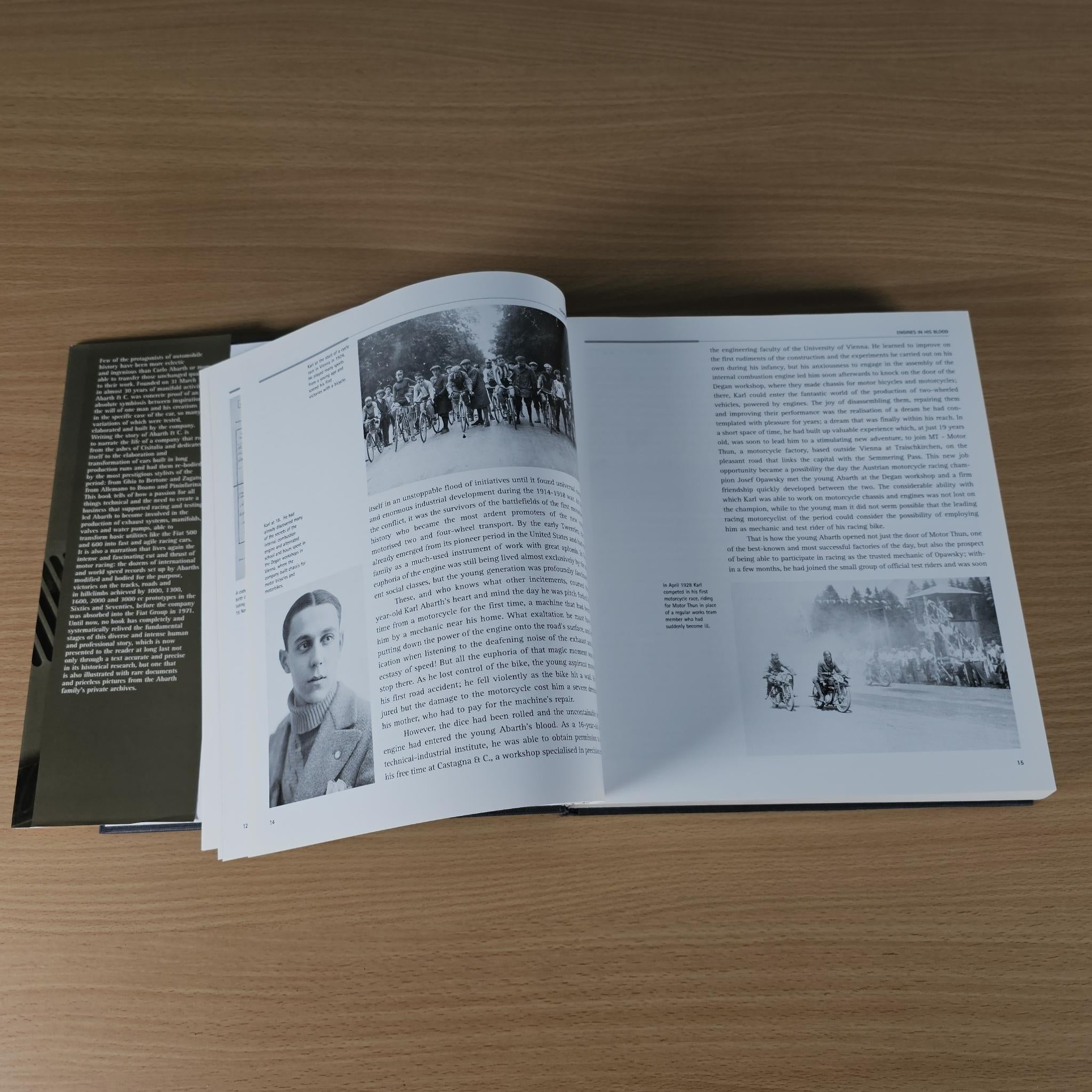 Open hardcover car book with black-and-white photos of people and cars.