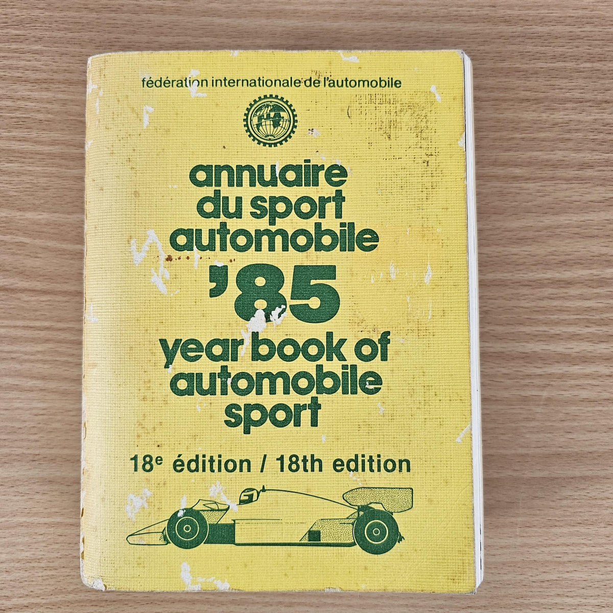 FIA year book of automobile sport 18th edition hardcover book with green car line art.