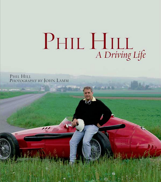 Phil Hill: A Driving Life book cover with man beside red race car and title text
