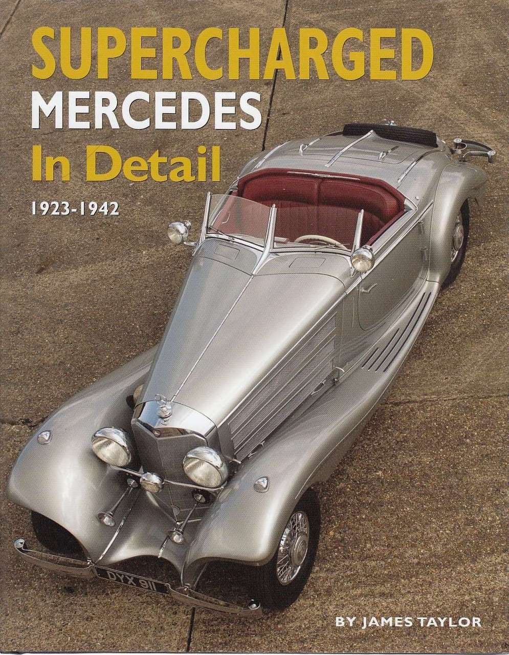 Hardcover book cover with silver classic car, red cabin, and supercharged Mercedes title