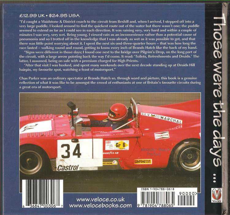 Motorsport book back cover with red race car photo and detailed text