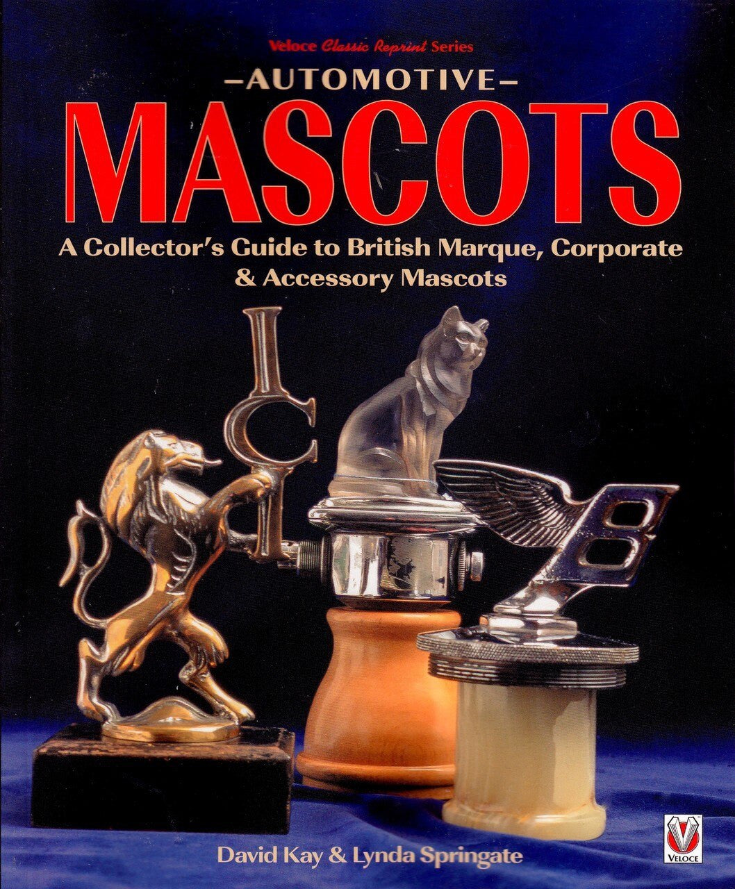 Automotive Mascots collector's guide book cover with gold and silver mascot figures