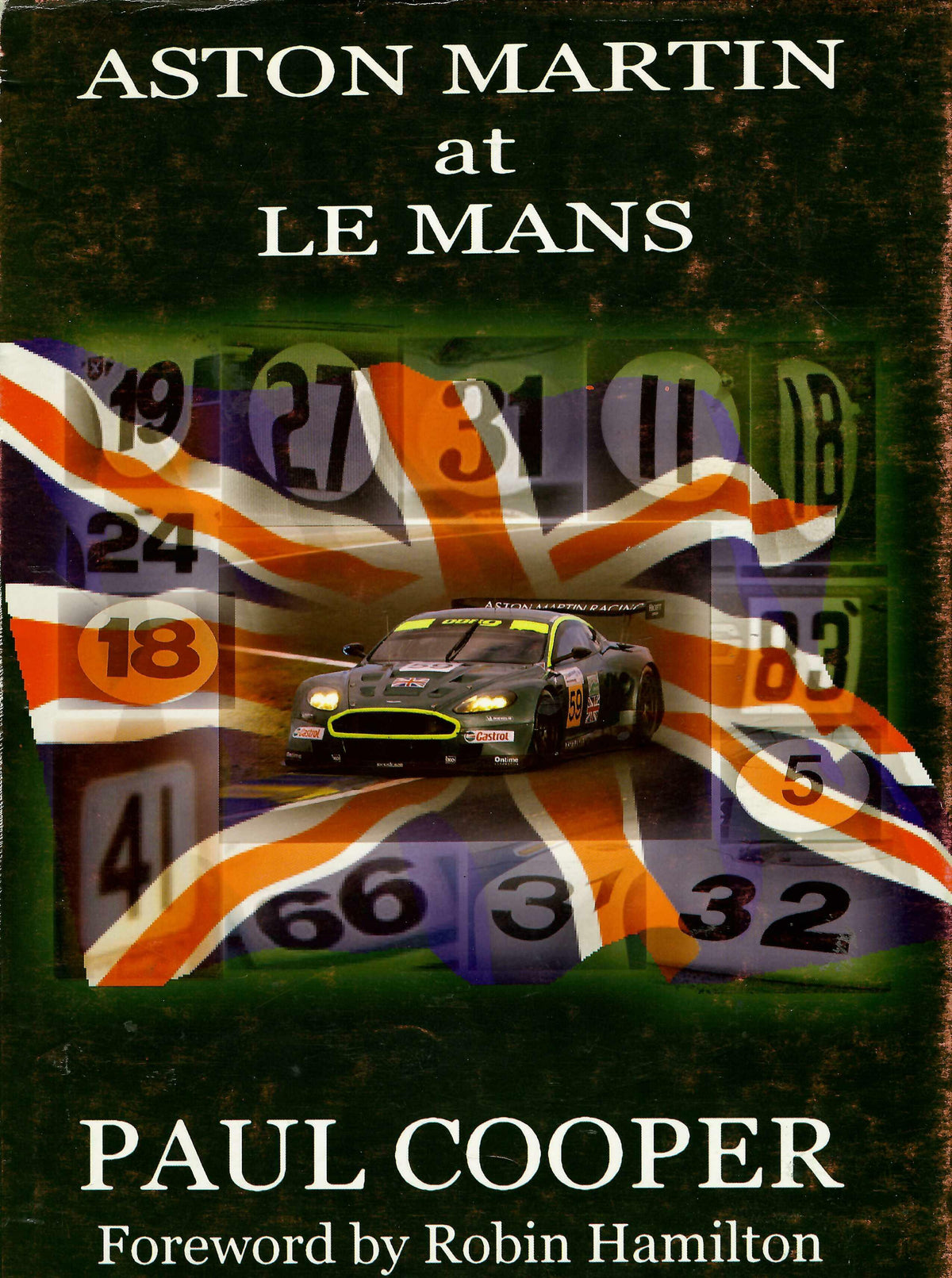 Hardcover book Aston Martin at Le Mans by Paul Cooper, race car cover with flag graphics