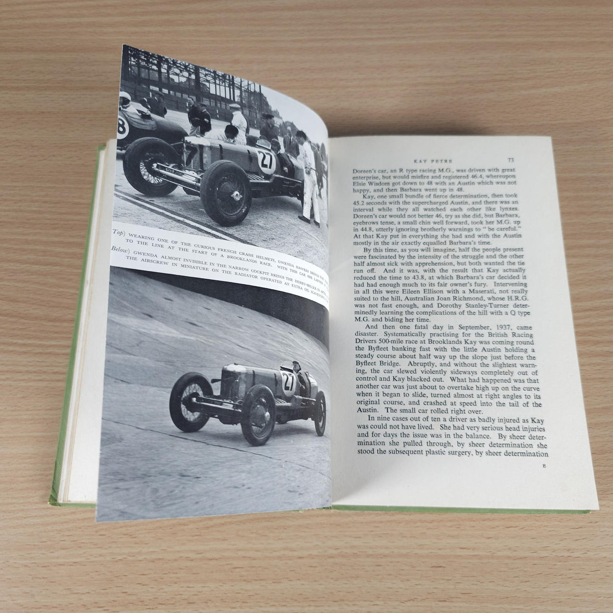 Open book spread with black-and-white race car photos and text paragraphs.