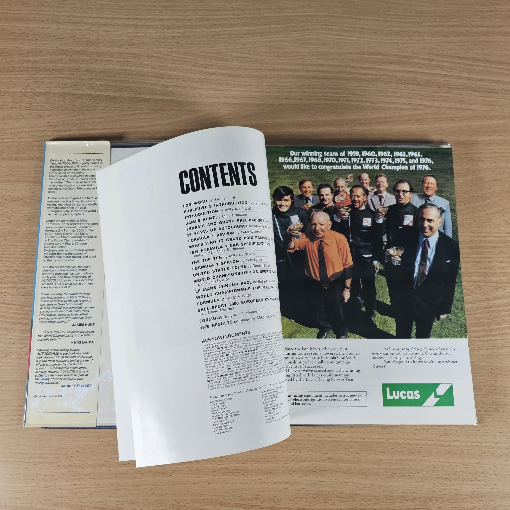 Hardcover racing annual book, open spread with CONTENTS page and team group photo