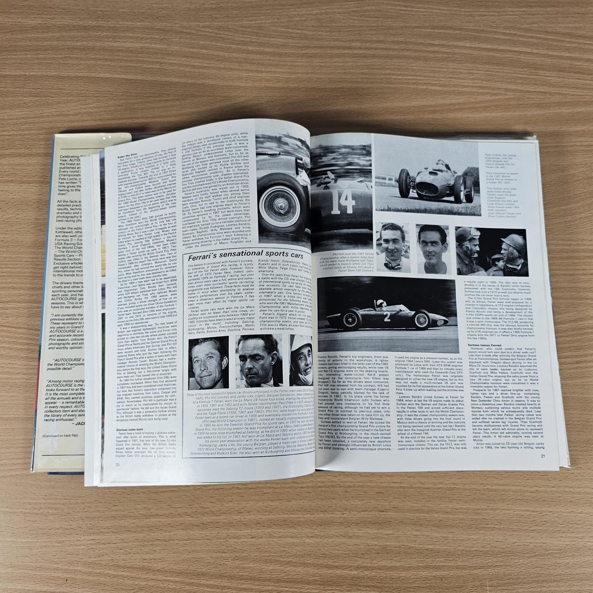 Hardcover racing annual book, open pages with dense text and black-and-white race photos