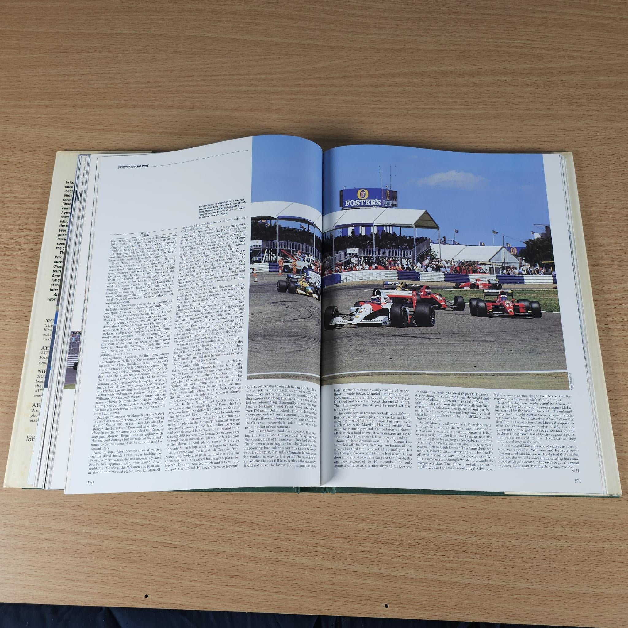 Open racing annual book spread with circuit race lineup photo and text columns