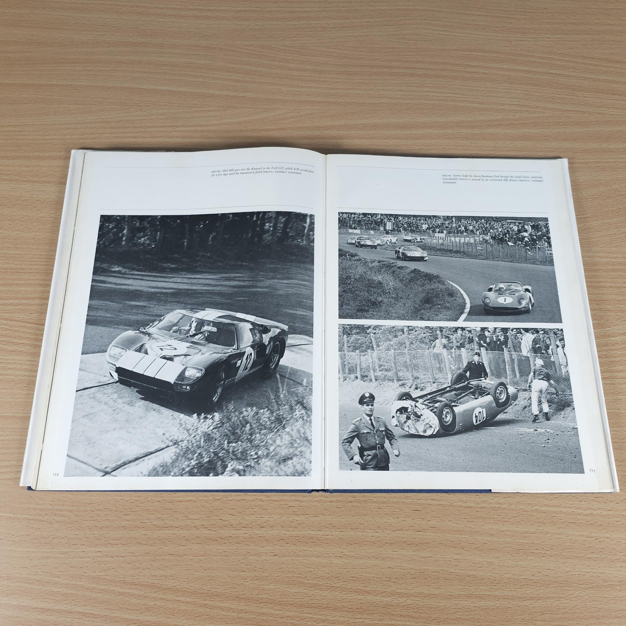 Vintage motorsport review book open to two black-and-white racing photo pages