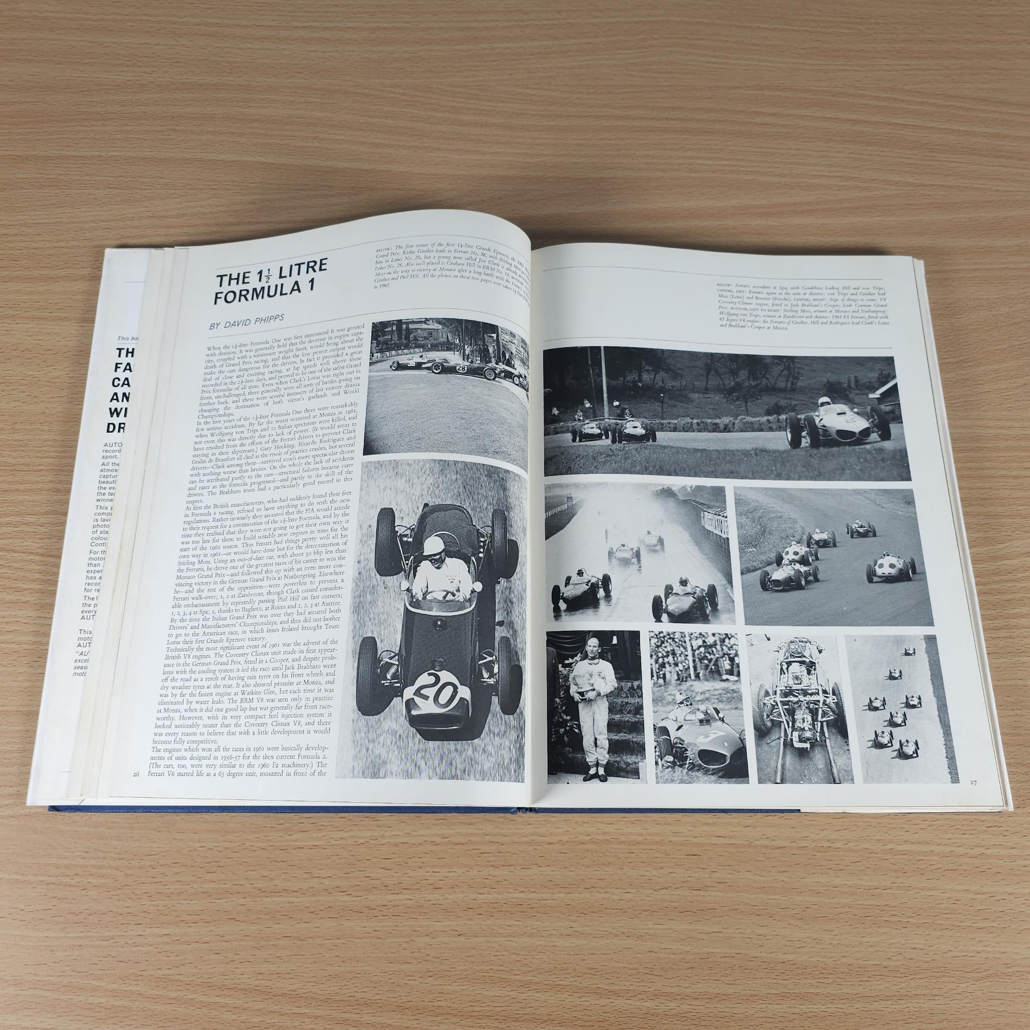 Open vintage motorsport review book spread with car image, small photos, and article text