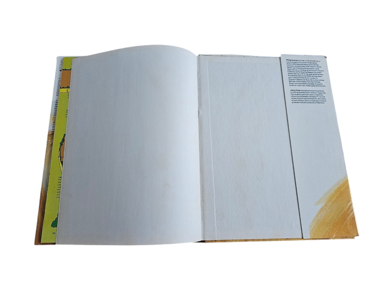 Open book with mostly blank white pages and a thin spine crease.