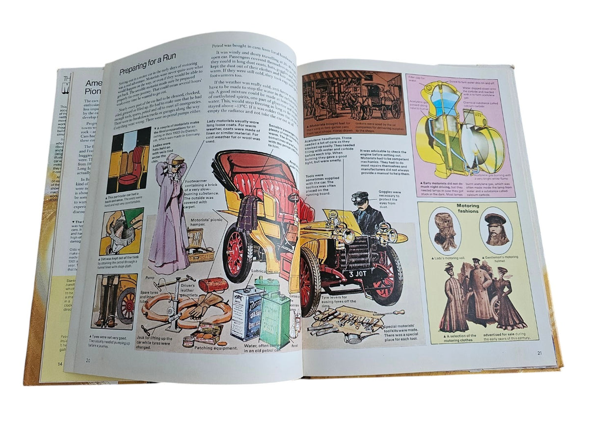 Open book displaying diagrams and drawings of early cars.