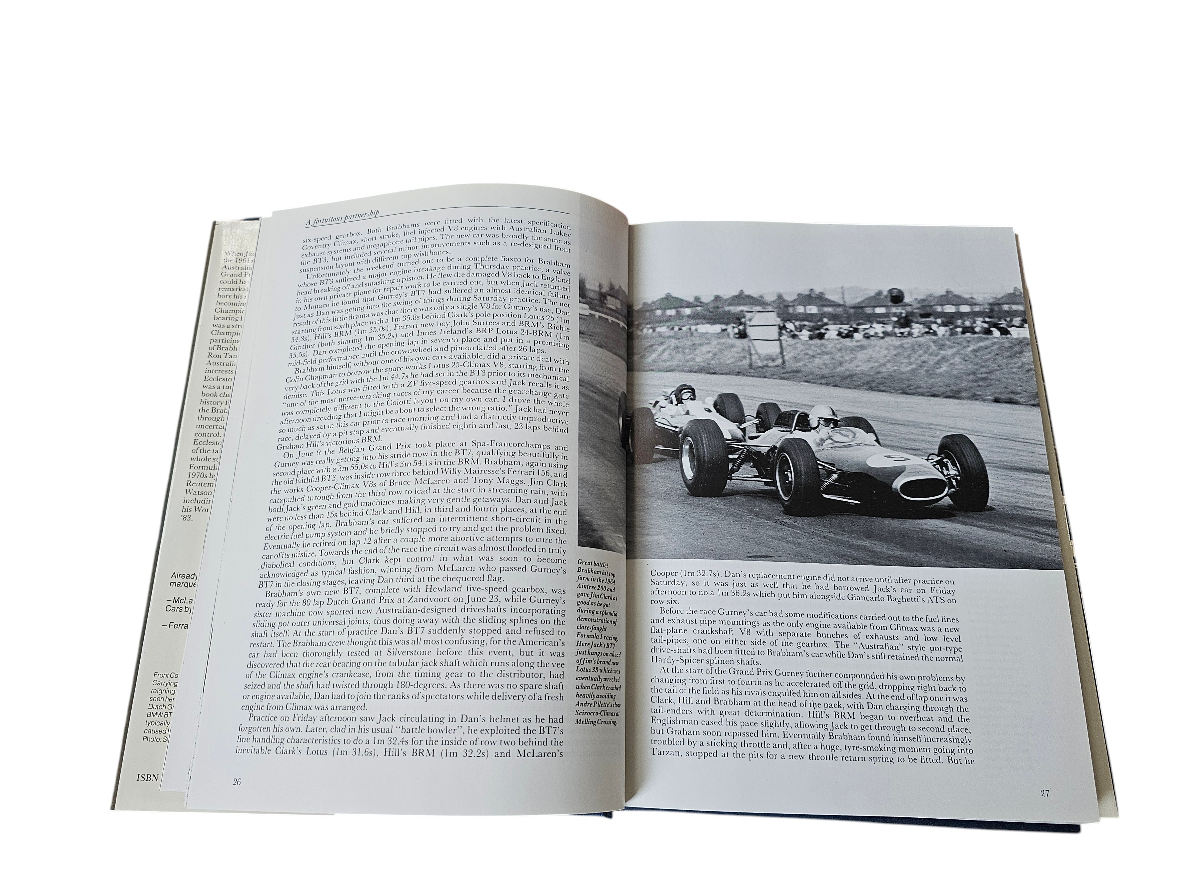 Brabham Grand Prix Cars book open to race car photo spread and dense text
