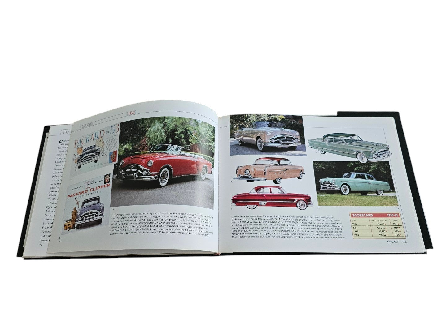 Automoto Bookshop Cars of the 1950's hardcover book open to a page featuring vintage Packard car photographs and history